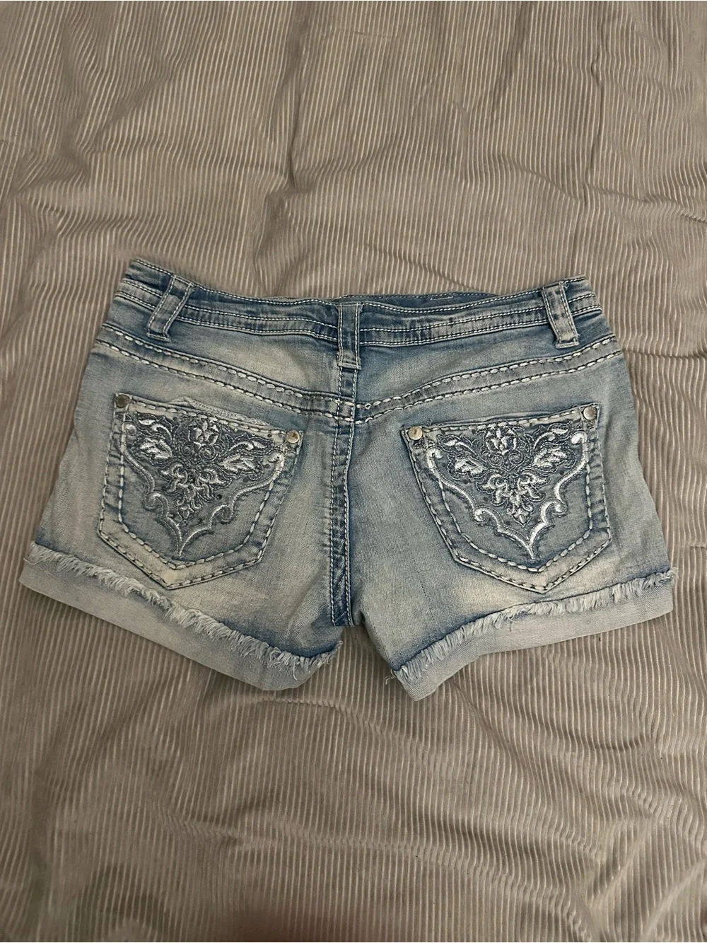 Women’s Light Blue Denim Shorts with Distressed Hem